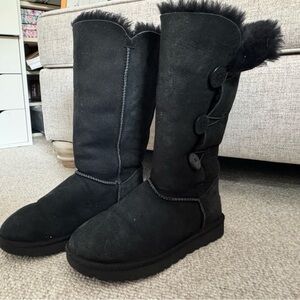 Black tall Ugg boots